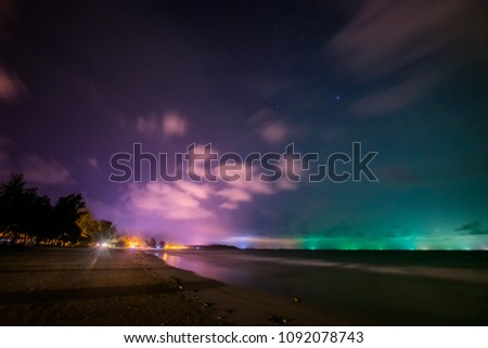 Colourful sky in the night at Tungwualaen Beach, Patew District, Chumphon, Thailand.