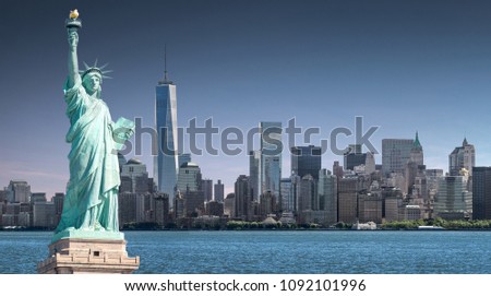 The Statue of Liberty with high-rise building in Lower Manhattan background, Landmarks of New York City, USA