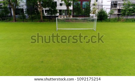 Aerial first person view photo from soccer ball perspective shot into goal soccer is played by 250 million players in over 200 countries and dependencies making it worlds most popular sport