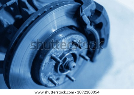 Brake discs of the machine. Repair of the chassis of the car. Repair Wheels Machine.