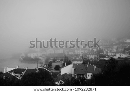 Black and white city , foggy
