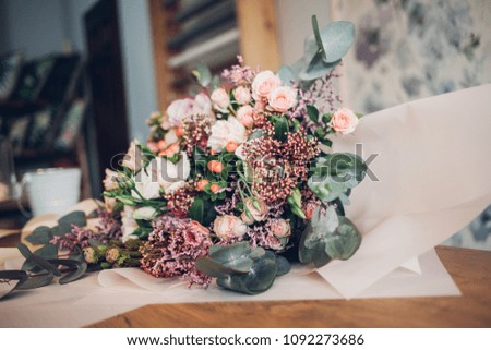 bouquet of flowers stands on the table