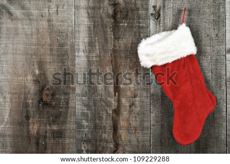 High contrast grunge Christmas sock on wood