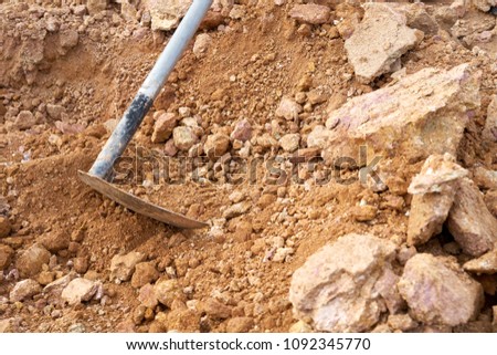 Dredging tools used by people called hoe spades are used to excavate the soil is not very deep. Planting or digging small holes for agricultural and construction purposes. Popularity is in the home.