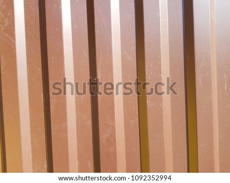 Metal rusty fence. Decorative parts of metal gates. Texture of old metal background. Geometric pattern. Concept: creative, fence