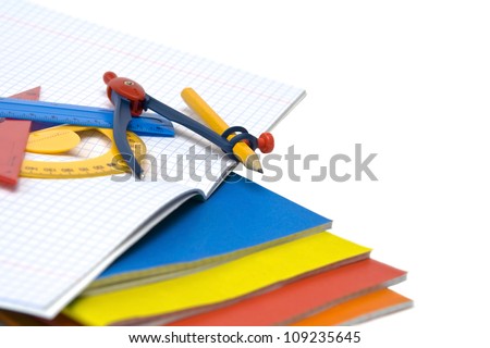 Colourful exercise books and other school supplies