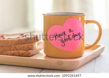 Breakfast In Bed In the Morning, Cup Of Coffee And Toast With Sticky Notes Have A Good Day. Pleasant Surprise A Friend Or Loved One.