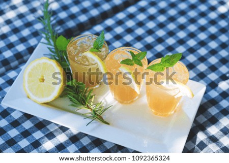 Fresh ice honey lemon drink in a glass.