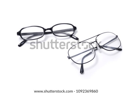 Modern fashionable and office spectacles isolated on white background. Perfect reflection eye glasses on table for copy space