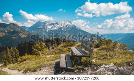 Beautiful alpine view near the Piller lake with a bench