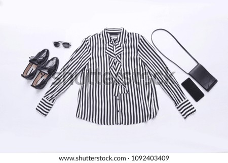 striped clothes with black shoes,sunglasses isolated 
