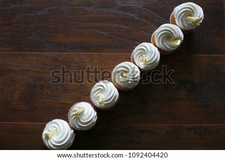 lemon cupcakes on a brown background