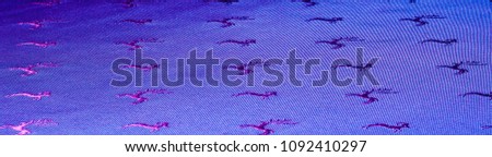 blue fabric texture. tissue, textile, cloth,  material, cloth, typically produced by weaving or knitting textile fibers.