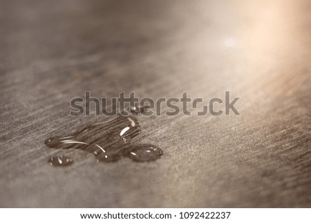 Beautiful Water Drops On Wooden Table With sunlight