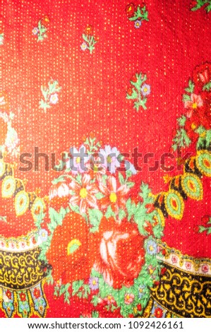 Texture background pattern. Woolen fabric Bright red color With rose flowers, this is the design and creation of art objects for interior design such as designer ornaments, wallpapers and other items