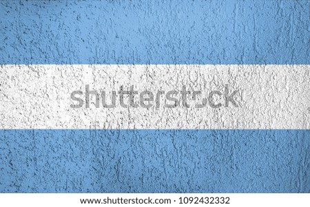 Texture of the flag of  on a wall of Argentina plaster.