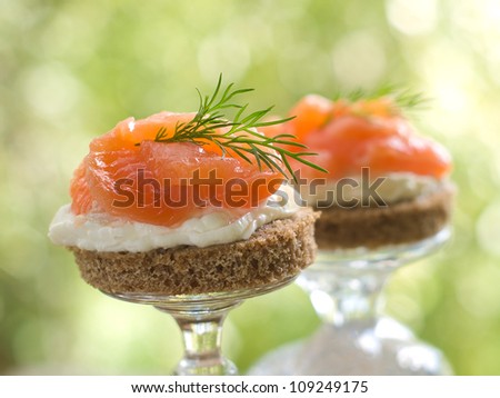 Canape with  salmon and dill for party, selective focus