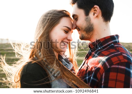 Smiling couple in love outdoors. Royalty-Free Stock Photo #1092496841