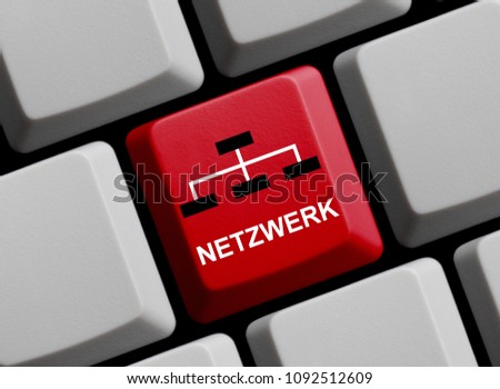 Red Computer Keyboard showing Network in german language