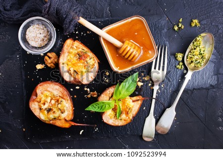 baked pears with cheese nuts honey, stock photo