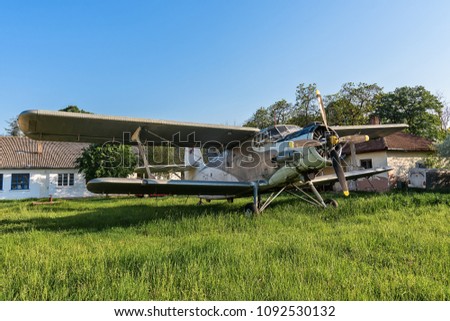 Old aircraft close up on grass