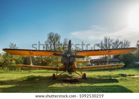 Old aircraft close up on grass