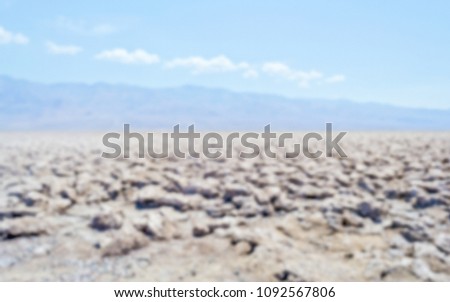 Defocused background of Devil's Golf Course in Death Valley, California. Intentionally blurred post production for bokeh effect