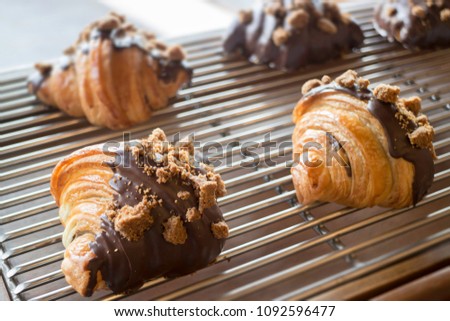 Fresh baked croissant for sale, stock photo
