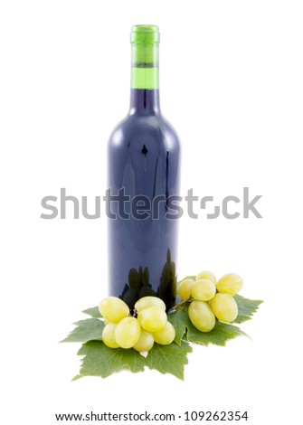 Wine Bottle and grapes with leaves.