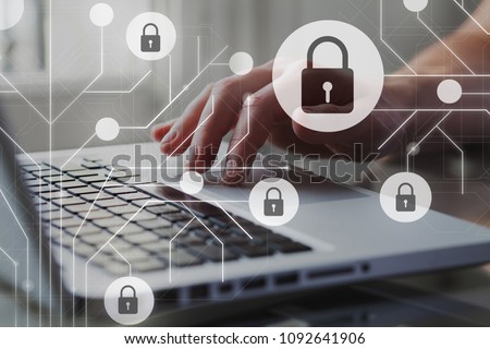 Cyber internet security concept. GDPR and cybersecurity. Protection of private personal data. A person using internet on laptop on the background.