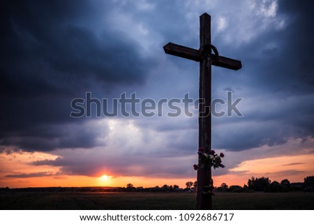 wayside cross during sunset