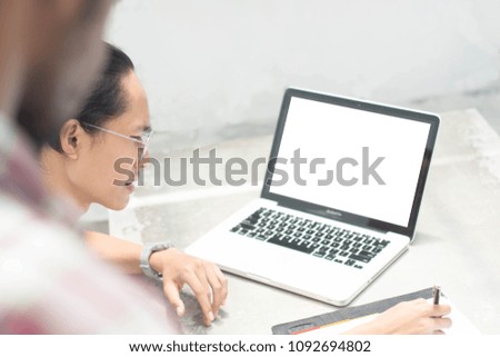 coworkers give thumb up at friend, young asian man with glasses with laptop and notebook get thumb up from friend