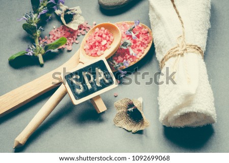 SPA set with pink salt and flowers/toned photo