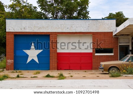 Texas Flag painted on Garage Doors of Abandoned Gas Station