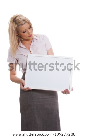 Young attractive girl holding empty message board isolated on white