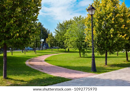 Alley in park Tsaritsyno at summer time Royalty-Free Stock Photo #1092775970