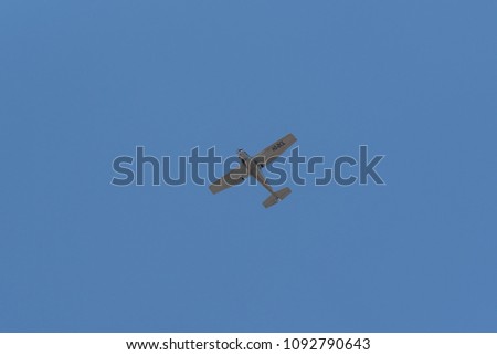 photo of propellor airplane  in the blue sky