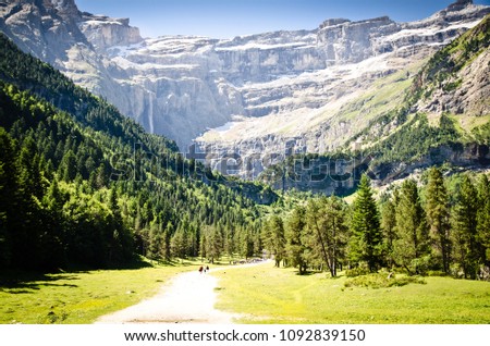 Hiking to the beautiful waterfall of the Cirque de Gavarnie in the french Pyrenees.