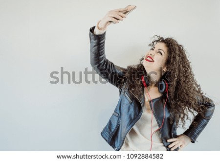 young girl happy and urban to listening music from headphone stereos
