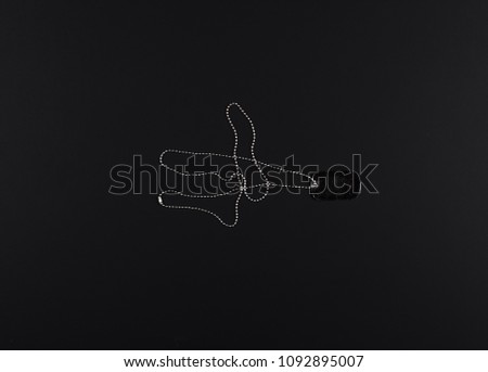 military sign with chain on a black background