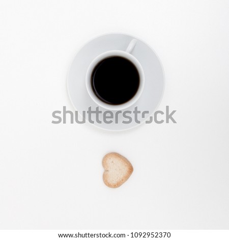 Sweet Dessert cookies in the shape of a heart with coffee on white background. Good morning, breakfast. Spring. Flat lay. Minimalism. Minimalism Stock Photography