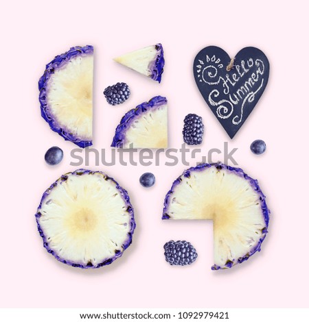 Creative concept with pineapple. Bright juicy summer background. A set of slices of pineapple with a dyed crust. Flat lay, top view.  Minimum summer concept.