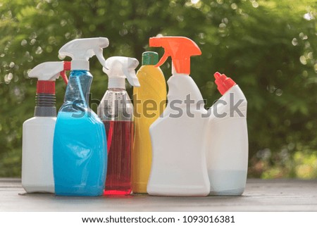 Cleaning products for cleaning of premises. On a green background.