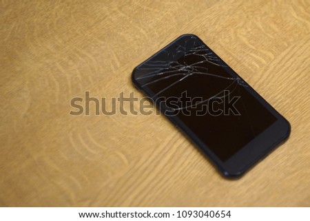 Mobile phone with craced screen after acsident.