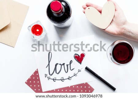 concept of Valentine Day love letter white background top view