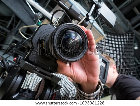 TV Professional studio digital video camera. cameraman