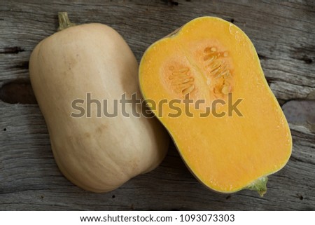 Butternut squash, pumpkin on natural background.