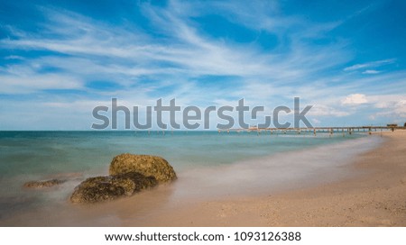 Beautiful seascapes with beach stones.Long exposure shot.