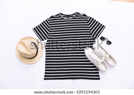 summer clothes on white,sunglasses,starfish, , hat, shoes  on flat lay, top view
