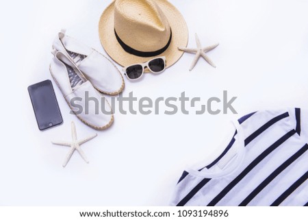 summer clothes collage on white,sunglasses,starfish, , hat, phoneshoes , flat lay, top view
